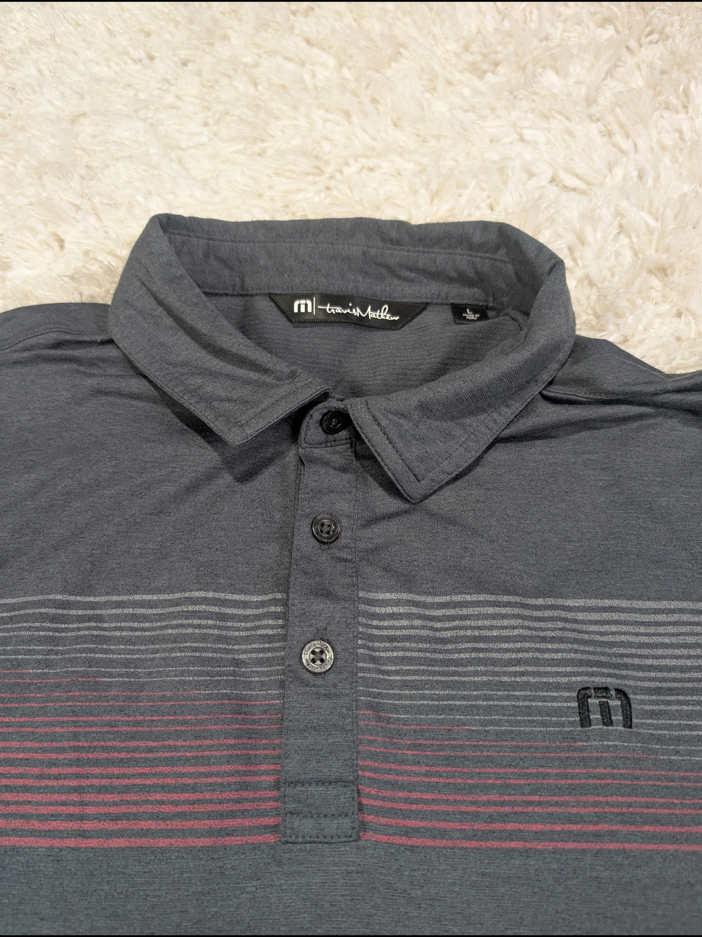 Travis Mathew Dark Gray Polo with Subtle Red and Light Gray Stripes